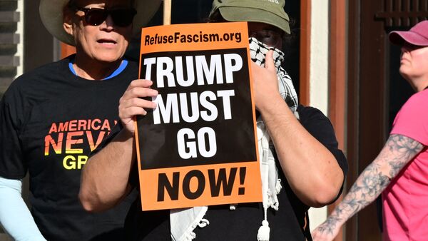 Protestors rally against US military action in Iran during a demonstration in Los Angeles on April 7, 2026. On April 7, US President Donald Trump warned that 'a whole civilization will die' in Iran if the country does not heed his midnight cutoff to open the Strait of Hormuz, as Tehran reported US-Israeli attacks on its infrastructure were already underway.