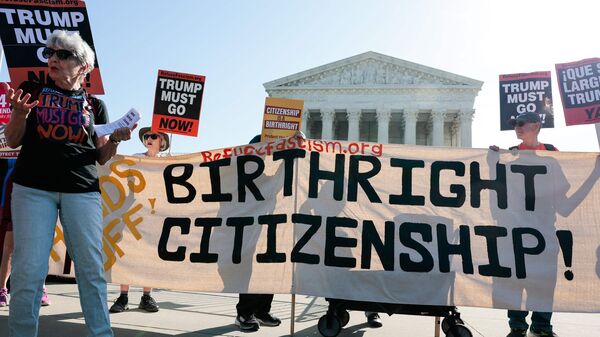 Demonstrators rally in support of birthright citizenship outside the US Supreme Court as President Donald Trump attends oral arguments in Washington, DC on April 1, 2026. President Donald Trump is watching in person as the US Supreme Court hears a landmark case weighing the constitutionality of his contentious bid to end birthright citizenship, an extraordinary and possibly unprecedented move for the nation's highest office. (Photo by Kent Nishimura / AFP)