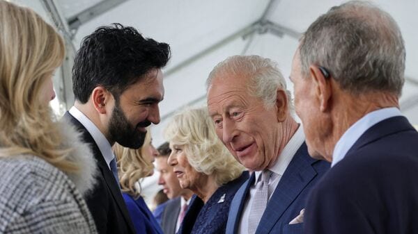 Britain's King Charles standing next to Queen Camilla interacts with New York City Mayor Zohran Mamdani during a visit to the 9/11 Memorial, in New York City, U.S., April 29, 2026. REUTERS/Jeenah Moon/Pool