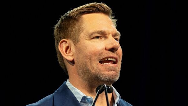 FILE PHOTO: California gubernatorial candidate Eric Swalwell speaks during the California Democratic Convention in San Francisco, California, U.S., February 21, 2026.  REUTERS/Manuel Orbegozo/File Photo