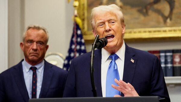 US President Donald Trump, next to U.S. Secretary of Health and Human Services Robert F. Kennedy Jr., makes an announcement linking autism to childhood vaccines and to the use of popular pain medication Tylenol for pregnant women and children, claims which are not backed by decades of science, at the White House, in Washington, D.C., U.S., September 22, 2025.