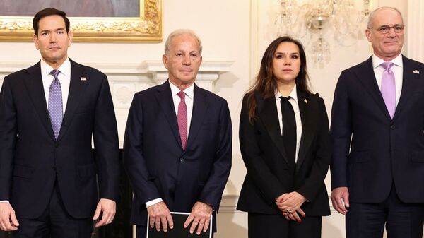 U.S. Secretary of State Marco Rubio, U.S. Ambassador to Lebanon Michel Issa, Lebanon Ambassador to the U.S. Nada Hamadeh Moawad and Israel Ambassador to the U.S. Yechiel Leiter pose for a photo before their meeting at the State Department in Washington, DC, U.S., April 14, 2026. REUTERS/Kevin Lamarque