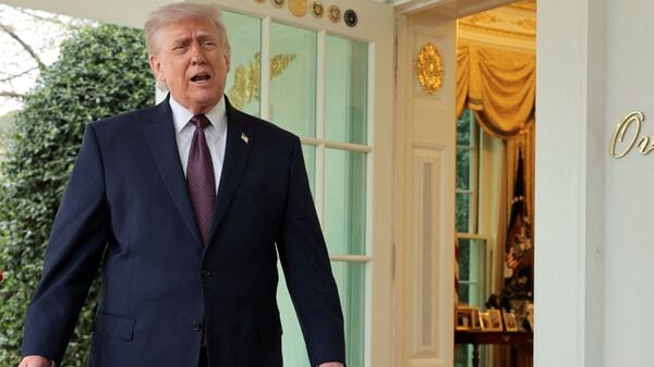 U.S. President Donald Trump speaks with reporters outside the Oval Office at the White House in Washington, D.C., U.S., April 13, 2026. REUTERS/Jonathan Ernst