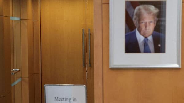 A portrait of U.S. President Donald Trump hangs in the lobby of the National Capital Planning Commission's offices