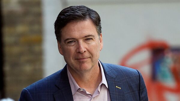 FILE PHOTO: Former FBI director James Comey arrives at the Irish Film Institute for for a public interview in Dublin, Ireland June 22, 2018. REUTERS/Clodagh Kilcoyne/File Photo