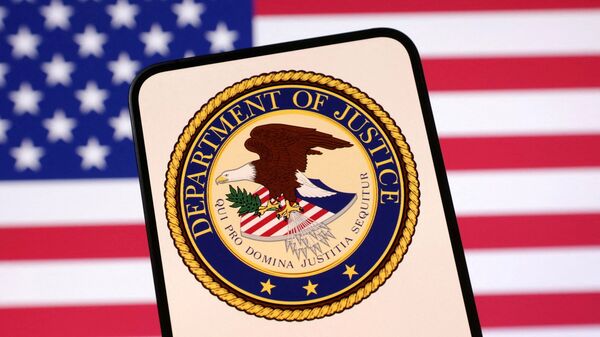 FILE PHOTO: United States Department of Justice logo and U.S. flag are seen in this illustration taken April 23, 2025. REUTERS/Dado Ruvic/Illustration/File Photo