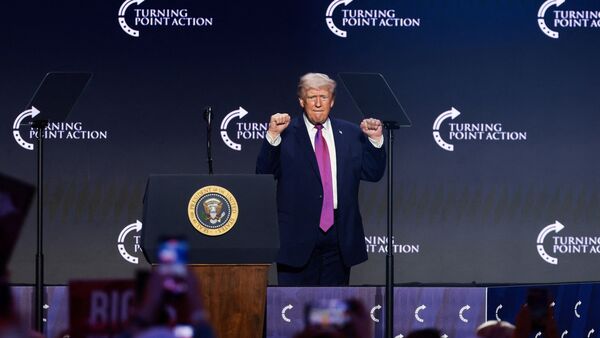 U.S. President Donald Trump gestures during a Turning Point USA event at Dream City Church in Phoenix, Arizona, U.S., April 17, 2026. REUTERS/Evelyn Hockstein