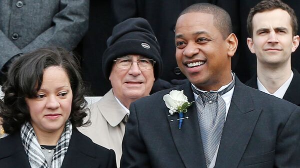 FILE - Lt. Gov. Justin Fairfax, right, and his wife, Cerina, at the inauguration of Gov. Ralph Northam at the Capitol in Richmond, Va., Saturday, Sept. 13, 2018. (AP Photo/Kevin Morley, File)