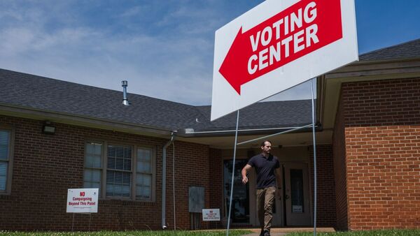 Voting Center signage outside a polling location during a primary election in Mobile, Alabama, US, on Tuesday, May 19, 2026. Photographer: Micah Green/Bloomberg