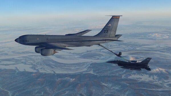 This photo provided by the U.S. Department of Defense shows a North American Aerospace Defense Command F-16 fighter refueling from a KC-135 Stratotanker over western Alaska on Thursday, Feb. 19, 2026. (U.S. Department of Defense via AP)