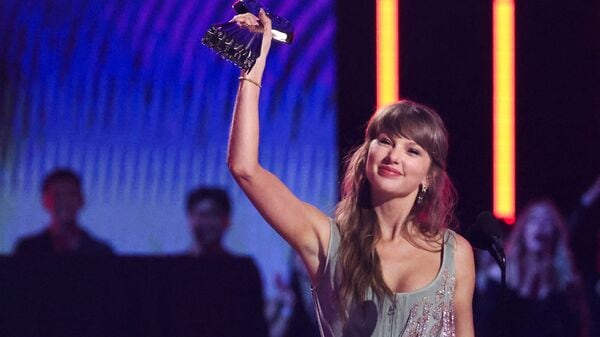 FILE PHOTO: Taylor Swift accepts the Pop Album of the Year award at the 2026 iHeartRadio Music Awards at the Dolby Theatre in Los Angeles, California, U.S., March 26, 2026. REUTERS/Mario Anzuoni/File Photo