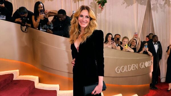 Julia Roberts poses on the red carpet at the 83rd Annual Golden Globes in Beverly Hills