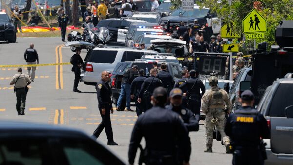 Emergency workers respond at the scene of a reported active shooter situation at the Islamic Center in San Diego, California, U.S., May 18, 2026.  REUTERS/Mike Blake
