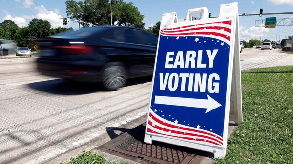 Vehicles drive by an early voting sign outside of the Louisiana State Archives on May 02, 2026 in Baton Rouge, Louisiana. Early voting for Louisiana's May 16 primaries began today for U.S. Senate and Louisiana state party candidates. Tyler Kaufman/Getty Images/AFP