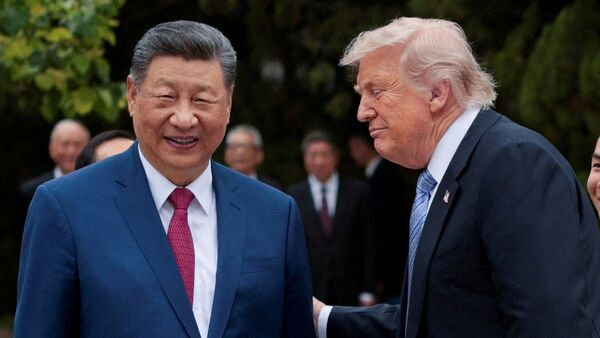 US President Donald Trump and Chinese President Xi Jinping leave after a visit to the Zhongnanhai Garden in Beijing, China, on 15 May, 2026.