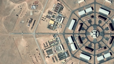 A satellite image shows military activity underway at the Xinjiang octagon-shaped installation, with large tents and a range of military vehicles, in the Xinjiang Uyghur Autonomous Region, China. (Vantor/Handout via REUTERS)