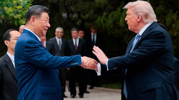 FILE - U.S. President Donald Trump, right, shakes hands with Chinese President Xi Jinping while leaving after a visit to the Zhongnanhai Garden in Beijing, Friday, May 15, 2026. (Evan Vucci/Pool Photo via AP, File)