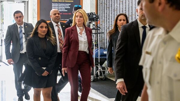 Former Attorney General Pam Bondi, center, arrives for her deposition at the Rayburn House Office Building on Capitol Hill, Friday, May 29, 2026, in Washington. (AP Photo/Rod Lamkey, Jr.)
