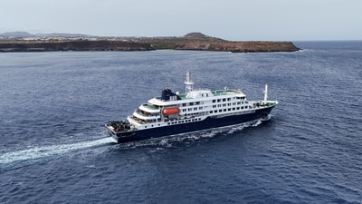 A drone view of the cruise ship MV Hondius, carrying passengers suspected of having cases of hantavirus on board, leaves Praia, Cape Verde, May 6 (REUTERS)