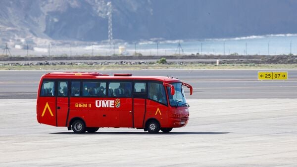 A bus carrying passengers of the cruise ship MV Hondius, which was affected by a hantavirus outbreak, on the tarmac at Tenerife Sud airport, Canary Islands, Spain, May 10, 2026.