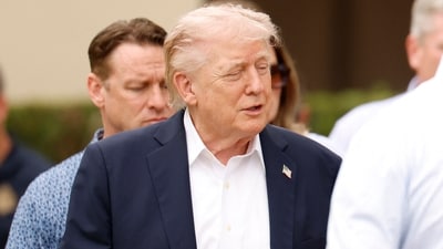 President Donald Trump arrives to the Trump suite during the final round of the Cadillac Championship 2026 (Getty Images via AFP)