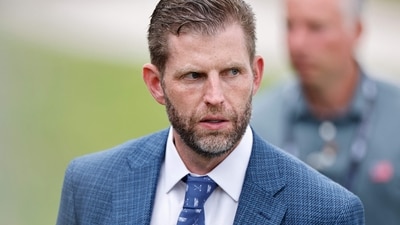 Eric Trump announced plans to sue Jen Psaki after she questioned his business interests while accompanying his father on a trip to China. (Getty Images via AFP)