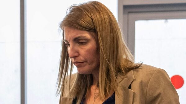 (FILES) Plaintiff Laetitia R. arrives for the trial of Guillaume B., who is accused of multiple acts of abuse against his partner over seven years from 2015 to 2020, at the Alpes-de-Haute-Provence court in Digne-les-Bains, southeastern France, on May 18, 2026. (Photo by MIGUEL MEDINA / AFP)