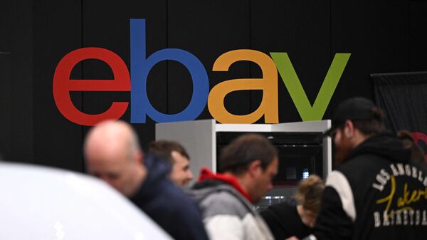 (FILES) The logo of e-commerce company Ebay is pictured at an exhibition booth for vehicle parts at the Essen Motor Show in Essen, western Germany on December 4, 2024 (Photo by Ina FASSBENDER / AFP)
