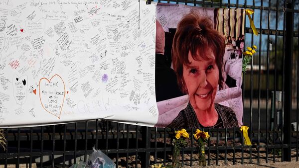A photograph of Nancy Guthrie is seen on a sign that people can leave messages on February 26, 2026, in Tucson, Arizona. Joe Raedle/Getty Images/AFP