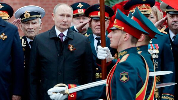 Russian President Vladimir Putin attends a wreath-laying ceremony after the 2021 Victory Day parade in Moscow.