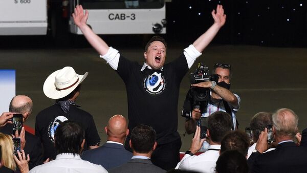 SpaceX CEO Elon Musk celebrates the successful launch of a rocket at the Kennedy Space Center in 2020.