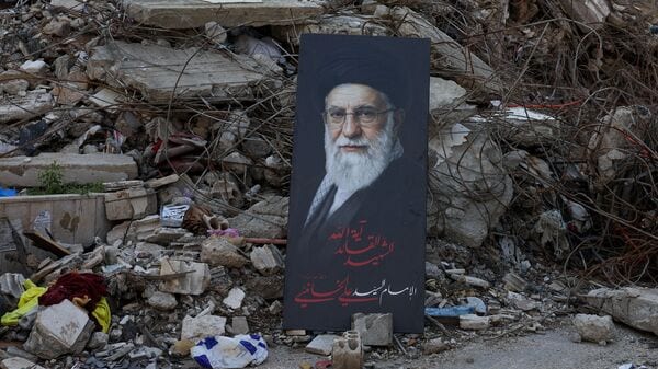 A portrait of late Supreme Leader of Iran, Ayatollah Ali Khamenei, at the site of an Israeli strike that took place before a temporary ceasefire went into effect, on the southern suburbs of Beirut, Lebanon, May 6, 2026. REUTERS/Mohamed Azakir