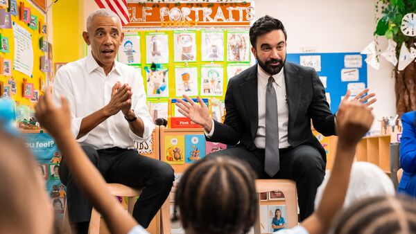 A file image of Former President Barack Obama and Mayor Zohran Mamdani singing 'Wheels on the Bus' to children at Learning Through Play Pre-K in the Bronx in New York