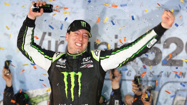 FILE - Kyle Busch celebrates his win in the NASCAR Nationwide series auto race, in Victory Lane at Richmond International Raceway in Richmond,