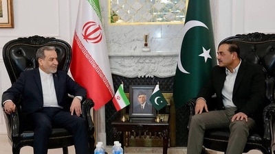 FILE: The handout photo shows Pakistan's Army Chief and Field Marshal Syed Asim Munir (R) meeting with Iran's Foreign Minister Abbas Araghchi upon his arrival in Islamabad. (AFP)