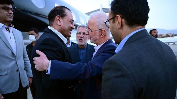 Latest news on May 23, 2026: This handout photograph, taken and released on May 22, 2026, by Pakistan's Inter-Services Public Relations (ISPR), shows visiting Pakistan's Army Chief Syed Asim Munir (2nd L) being greeted by Iran's Interior Minister Eskandar Momeni upon his arrival in Tehran as part of ongoing mediation efforts between Iran and the United States.