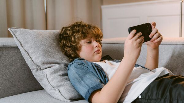 By adolescence, many young people spend more time on screens than sleeping or attending school. (Representative Image)