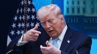 US President Donald Trump pretends to aim a sniper gun while speaking with reporters in the James Brady Press Briefing Room at the White House in Washington, April 6, 2026. (AP File)