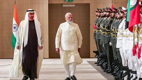 Prime Minister Narendra Modi with UAE President Sheikh Mohamed bin Zayed Al Nahyan during a ceremonial reception, in Abu Dhabi. (@NarendraModi/YT via PTI Photo)(PTI05_15_2026_000075B)