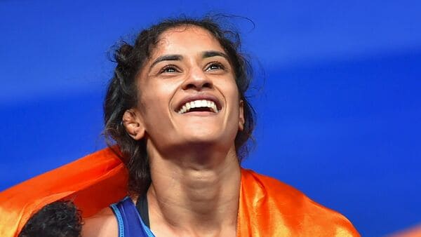 Vinesh Phogat celebrates winning the gold medal in the women's freestyle 50 kg wrestling event at the Asian Games 2018, in Jakarta