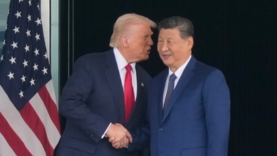 President Donald Trump and Chinese President Xi Jinping shake hands after their US-China summit meeting at Gimhae International Airport in Busan, South Korea on October 30, 2025. (AP)
