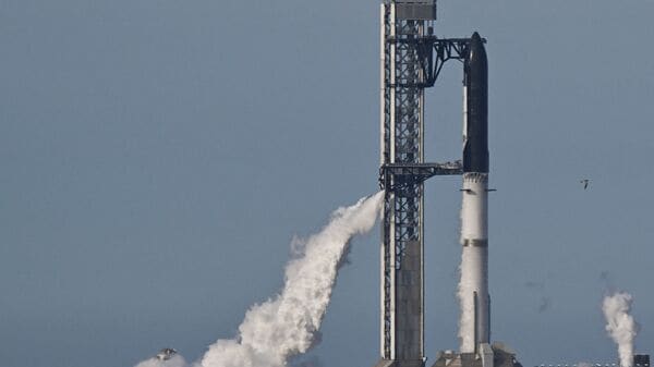 The SpaceX Starship spacecraft sits atop the Super Heavy Booster, ahead of the 12th test flight of the Starship spacecraft in Starbase, Texas, U.S., May 21, 2026. REUTERS/Steve Nesius