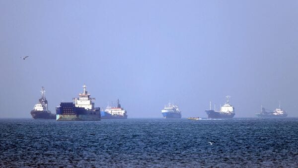 In this picture obtained from Iran's ISNA news agency on May 4, 2026, vessels are pictured anchored in the Strait of Hormuz off Bandar Abbas in southern Iran. Iran's Revolutionary Guards on May 4 (Photo by Amirhossein KHORGOOEI / ISNA / AFP) /