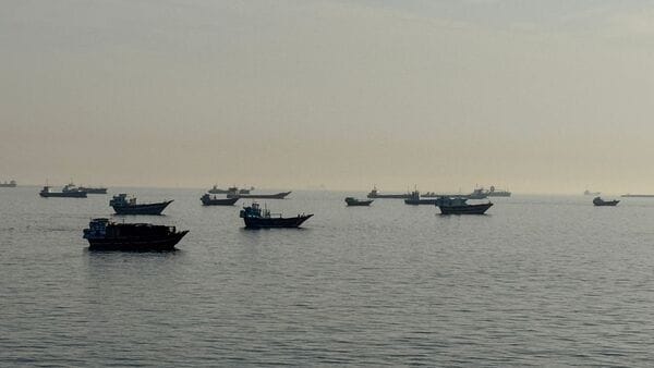 Vessels are seen anchored in the Strait of Hormuz, off the port city of Khasab on Oman�s northern Musandam Peninsula on May 17, 2026. (Photo by AFP)