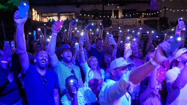 Attendees cheer during a Tall Tour event Saturday, May 9, 2026, in Austin, Texas.