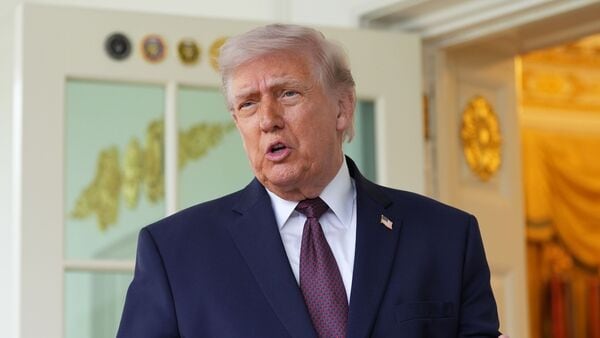 US President Donald Trump accused Iran of targeting vessels being escorted by US forces. The President also claimed on Truth Social that Iran had attacked commercial vessels, including a South Korean cargo ship, moving under American protection. (AP Photo/Alex Brandon)