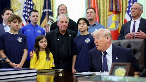 US President Donald Trump, second right, speaks during a memorandum signing in the Oval Office of the White House in Washington, DC, US, on Tuesday, May 5, 2026. Photographer: Tom Brenner/The Washington Post/Bloomberg