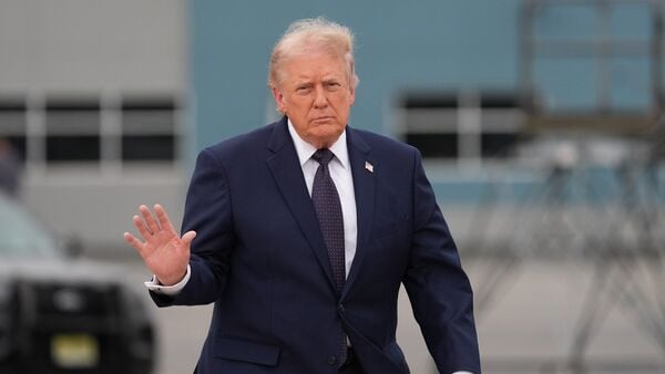 President Donald Trump walks from Marine One to board Air Force One at Morristown Airport