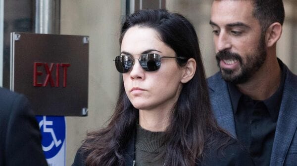 OAKLAND, CALIFORNIA - May 06: Shivon Zilis, a former OpenAI employee that has four children with Elon Musk departs court at the Ronald V. Dellums Federal Building on May 6, 2026 in Oakland, California. Elon Musk invested in OpenAI early on believing it would be a non-profit, but is now suing OpenAI and its CEO Sam Altman for allegedly deceiving him by developing OpenAI into a for-profit company.   Benjamin Fanjoy/Getty Images/AFP (Photo by Benjamin Fanjoy / GETTY IMAGES NORTH AMERICA / Getty Images via AFP)