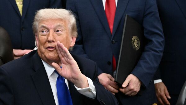 US President Donald Trump speaks after signing several executive orders in the Oval Office of the White House in Washington, DC on April 30, 2026. (Photo by Brendan SMIALOWSKI / AFP)